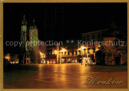 72885016 Krakow Krakau Marktplatz Kirche Nachtaufnahme Krakow Krakau - Pologne