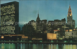 72497788 New_York_City United-Nations-Building Und Empire-State-Building At Nigh - Andere & Zonder Classificatie