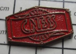912c Pin's Pins / Beau Et Rare / MARQUES / CNESS BASIC JEAN'S - Markennamen