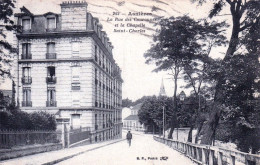   92 - Hauts De Seine - ASNIERES Sur SEINE - La Rue Des Couronnes Et La Chapelle Saint Charles - Asnieres Sur Seine