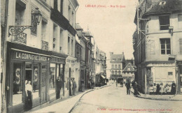 Laigle, Rue St-Jean Magasins Singer Epicerie 1909 - L'Aigle