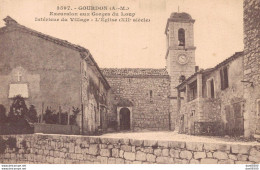 06 GOURDON INTERIEUR DU VILLAGE L'EGLISE - Gourdon