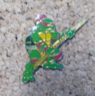 Pin's - Tortue Ninja Avec Bâton Jaune - Stripverhalen