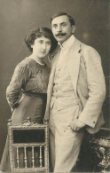 Social History Souvenir Photo Postcard Couple Moustache Dress - Photographs