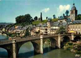 12 - Saint Geniez D'Olt - L'Eglise Le Pont Et Les Vieilles Maisons Au Bord Du Lot - CPM - Voir Scans Recto-Verso - Sonstige & Ohne Zuordnung