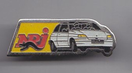 Pin's NRJ Renault Clio Réf 4972 - Medios De Comunicación