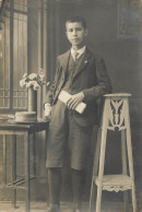 Souvenir Photo Postcard Elegant Boy Flower Vase Hat 1916 - Photographie