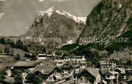 13740189 Grindelwald Dorfpartie Mit Wetterhorn Grindelwald - Andere & Zonder Classificatie