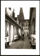 Fotografie Walter Wasssner, Lübeck, Ansicht Lübeck, Gasse Mit Kirchturm Im Hintergrund  - Lieux