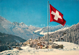 13303269 Arosa GR Schweizer Flagge Winterpanorama Alpen Arosa GR - Autres & Non Classés