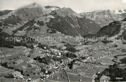 13283799 Gstaad Fliegeraufnahme Gstaad - Andere & Zonder Classificatie