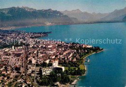 12825207 Vevey VD Batiment Nestle La Ville Lac Leman Et Les Dents Du Midi Vue Ae - Andere & Zonder Classificatie