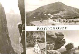 72770287 Karkonosze Berghaeuser Riesengebirge Wandergruppe Felsen  - Polen