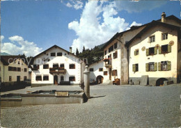 12377447 Scuol GR Dorfplatz Mit Brunnen Scuol GR - Sonstige & Ohne Zuordnung