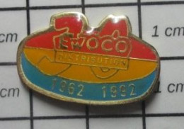 912B Pin's Pins / Beau Et Rare / MARQUES / EWOCO DISTRIBUTION 1962 1992 - Trademarks