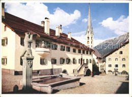 11889857 Zuoz GR Dorfplatz Brunnen Kirche Zuoz - Sonstige & Ohne Zuordnung