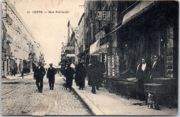 34 CETTE - La Rue Nationale - Marchand Cartes Postales  - Sete (Cette)
