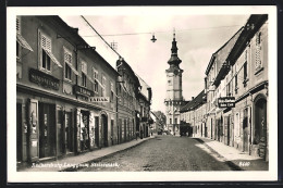 AK Radkersburg /Steiermark, Strasse Langgasse Mit Geschäften Und Kirche  - Autres & Non Classés