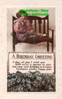 R419645 A Birthday Greetings. The Little Girl Is Sitting On A Bench. RP. 1927 - Welt