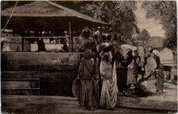 Women Carrying Chattles Of Water - Inde