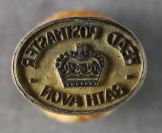 STAMP - BATH BRASS HANDSTAMP. Inscribed 'The Postmaster - Bath Avon'. Oval With Wooden Handle. 36 X 26 X 80mm. - ...-1840 Préphilatélie