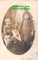 R420637 Girl And Boy With A Dog. Postcard - World