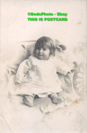 R420638 The Little Girl In A White Dress Is Sitting On A Chair. H. Tewson. Rembr - World