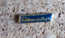 Pin's - La Blanche Porte - Trademarks