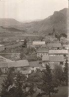 NEUSSARGUES (15) Le Vieux Bourg Et Le Rocher De Laval    CPSM GF - Autres & Non Classés