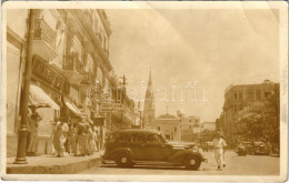 * T3 1937 Maracaibo, Street View, Automobile, Shops, Cauchos Goodyear. Photo (EB) - Unclassified
