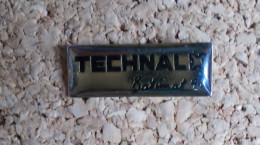 Pin's - Technal Batimat 91 - Markennamen