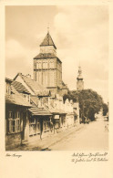 Postcard Germany Village Street And Clocktower - Autres & Non Classés