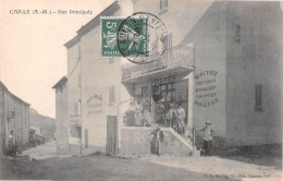 CAILLE (Alpes-Maritimes) - Rue Principale - Mercerie Ollivier - Voyagé (2 Scans) - Autres & Non Classés