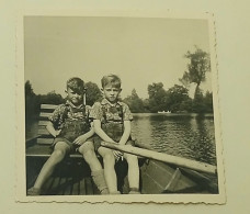 Two Boys In A Boat - Anonymous Persons