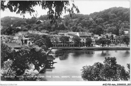 AHZP10-ASIE-0971 - QUEEN'S HOTEL FROM ACROSS THE LAKE - KANDY - CEYLON SRI LANKA CEYLAN - Sri Lanka (Ceylon)