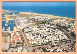 Ppgf/ CPSM Grand Format  - AUDE - PORT LEUCATE - ENTRE MER ET ÉTANG - VUE GÉNÉRALE AÉRIENNE - Autres & Non Classés