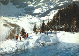 11896339 Leukerbad Thermalschwimmbad Im Winter Leukerbad - Autres & Non Classés