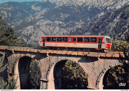 TRAIN # Chemin De Fer - Le Trinighellu - Passage De La Micheline Dans Un Paysage Corse Grandiose Cpm ♦♦♦ - Eisenbahnen