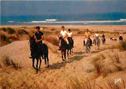 Animaux - Chevaux - Les Cavaliers Dans Les Dunes - CPM - Voir Scans Recto-Verso - Chevaux