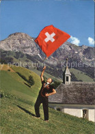11851909 Melchtal Fahnenschwinger Berge Kirche Melchtal - Sonstige & Ohne Zuordnung