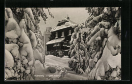 AK Auersberg I. Erzgeb., Verschneites Unterkunftshaus  - Auersberg