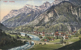 11754439 Amsteg Ortsansicht Mit Bruecke Und Alpenpanorama Amsteg - Other & Unclassified