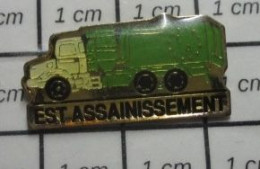 711e Pin's Pins : BEAU ET RARE : TRANSPORTS / CAMION EST ASSAINISSEMENT - Transports
