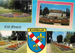 27 - Evreux - Le Jardin Public - Multivues - Fleurs - Blasons - CPM - Voir Scans Recto-Verso - Evreux