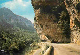 48 - Les Gorges Du Tarn - La Route Longeant Le Tarn - L'encorbellement Au Cirque Des Baumes - Flamme Postale - CPM - Voi - Gorges Du Tarn