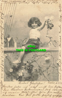 R585964 A Little Girl With Flowers In Her Hands Is Sitting On The Yard. 1902 - Welt