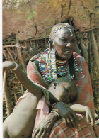 Masai Woman With Child - Tanzania