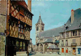 18 - Bourges - Eglise Notre-Dame Et, à Gauche, Maison Ancienne De La Rue Pellevoysin - Carte Neuve - CPM - Voir Scans Re - Bourges