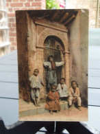 Cpa Couleur ALGER Enfants Arabes à La Porte De La Maison.1909 - Adressée à Mr M. Menuisier à   Wasselnheim - Wasselonne. - Alger