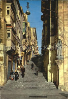 72580049 Valletta Malta A Typical Street Valletta Malta - Malta